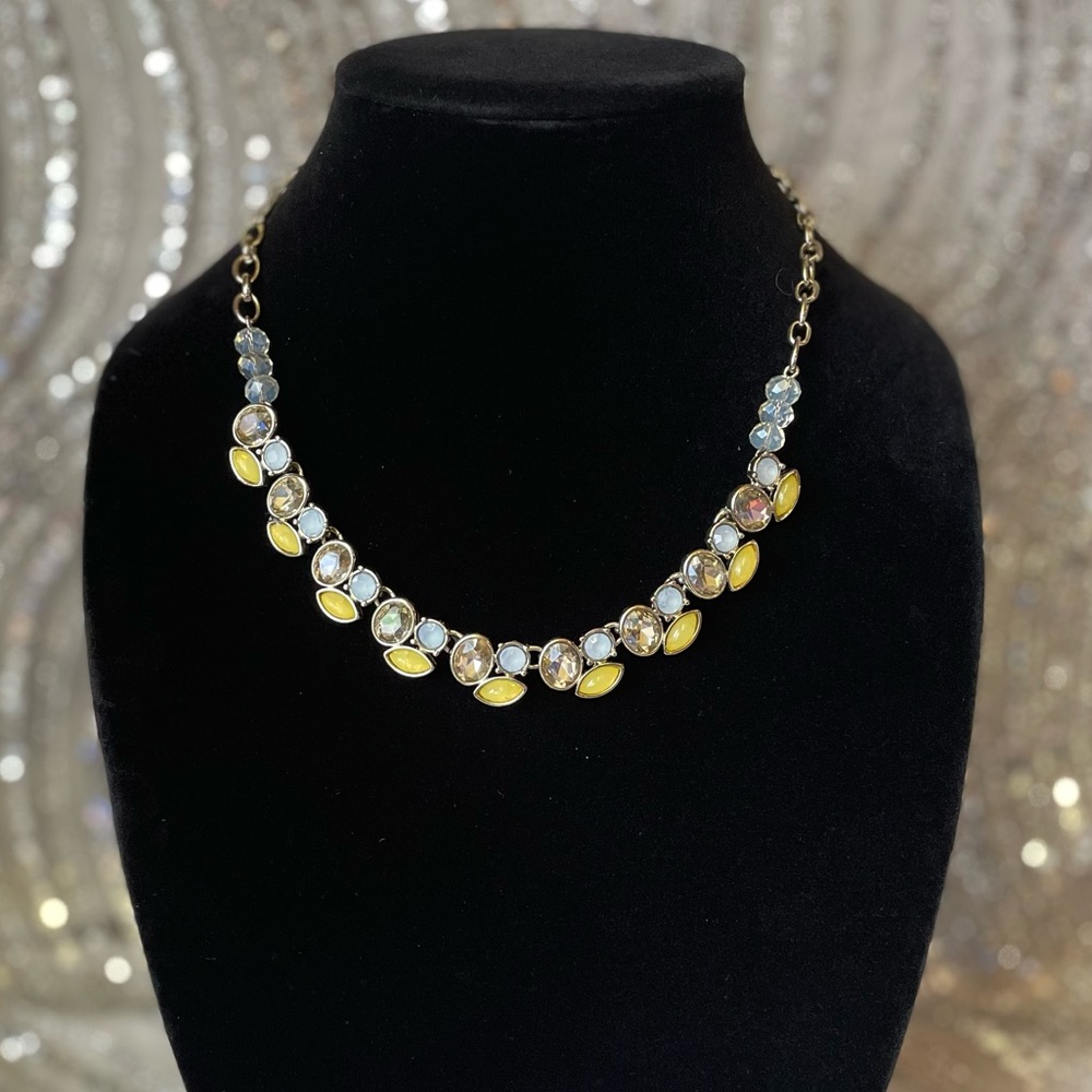 The Limited Necklace Silver Tone  with Yellow, Light Blue & Clear Stones.